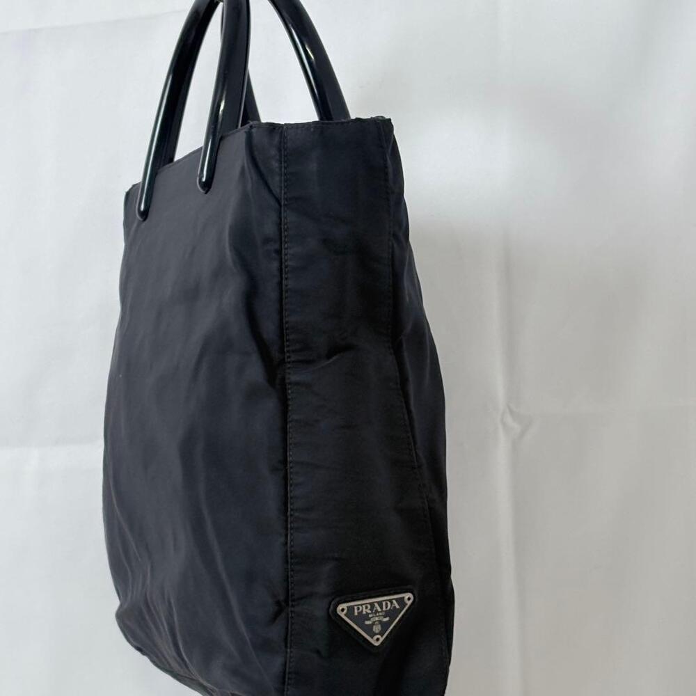 Prada handbag black arched handle triangular side
